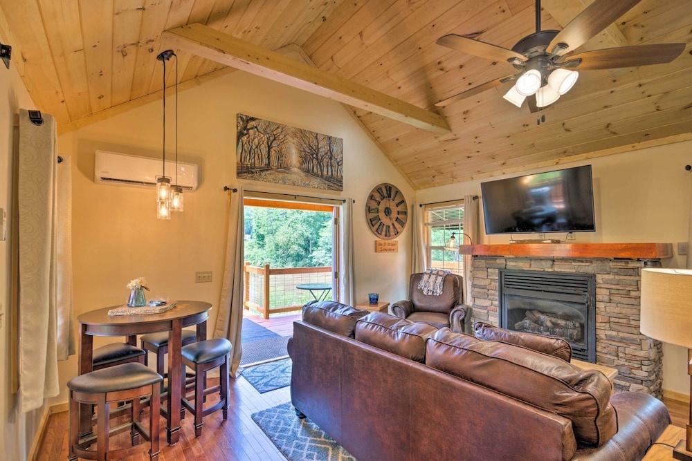 photo 1 of Deck & Hot Tub: Bryson City Riverfront Cabin!