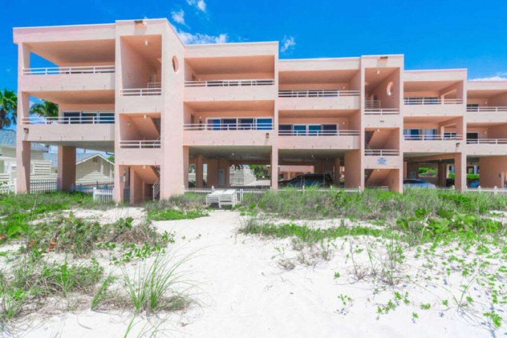 photo 1 of Coquina Beach Club 104 2 Bedroom Condo by RedAwning