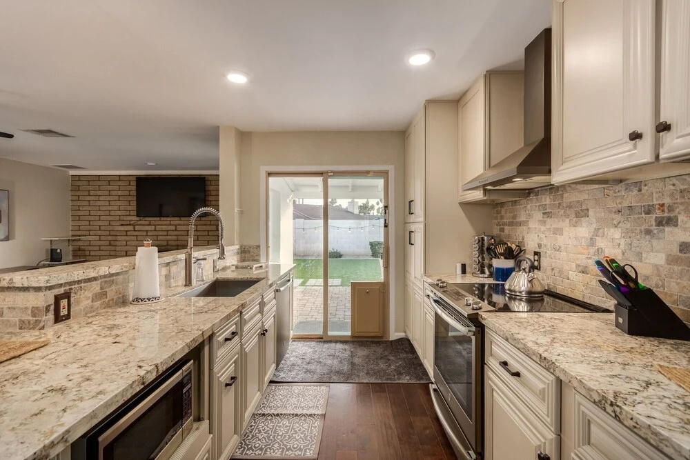 photo 1 of Showstopper! 3/2 With Sparkling Pool! Heart Of Phoenix! Sleeps 9! 3 Bedroom Home by Redawning
