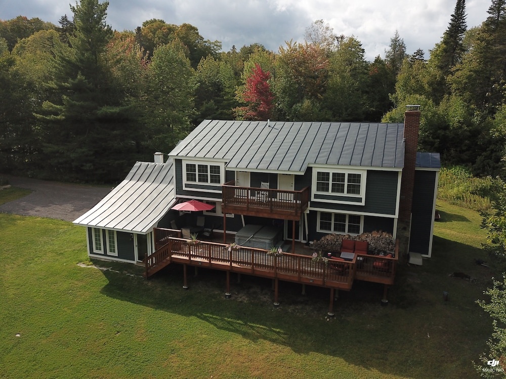 photo 1 of The Killington Bigelow Chalet: Large Ski Home. 8 Br/4.5 Ba/16 People. Hot Tub. Shuttle. Game Room. 8 Bedroom Home