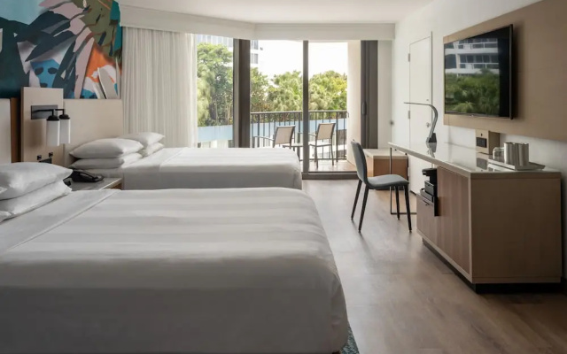 Quadruple room with balcony and with pool view