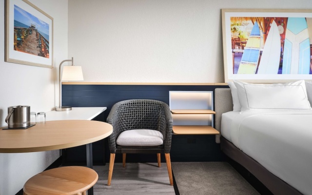 Quadruple room with balcony and with partial ocean view