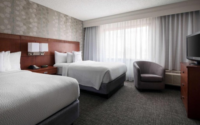 Deluxe Quadruple room with balcony and with pool view