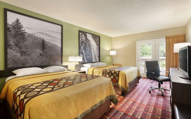 Deluxe Quadruple room with balcony