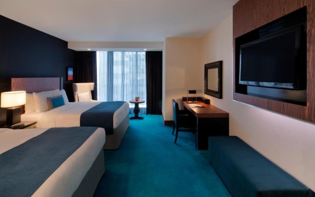 Standard Quadruple room with balcony and with city view