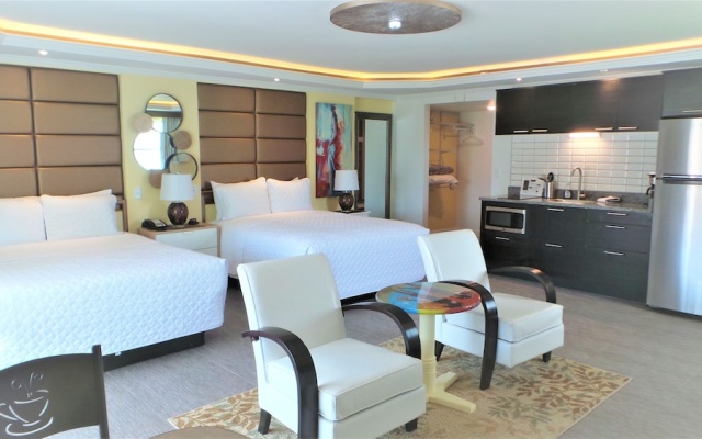 Deluxe Quadruple room with balcony