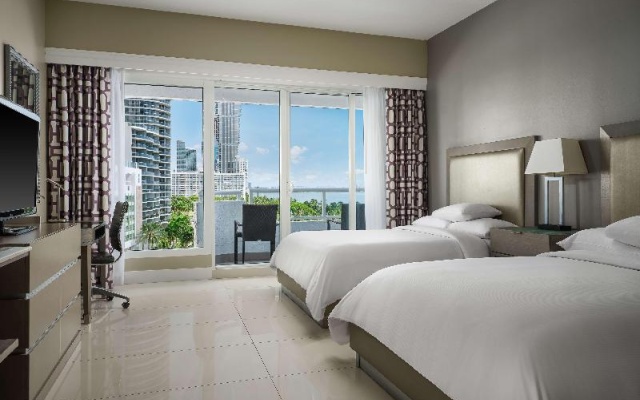Room with balcony and with park view