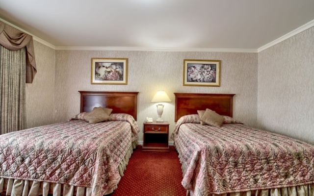 Deluxe Quadruple room with balcony