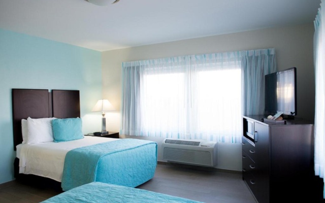 Standard Quadruple room with partial ocean view