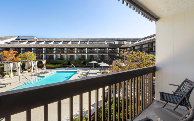 Standard Quadruple room with balcony and with pool view
