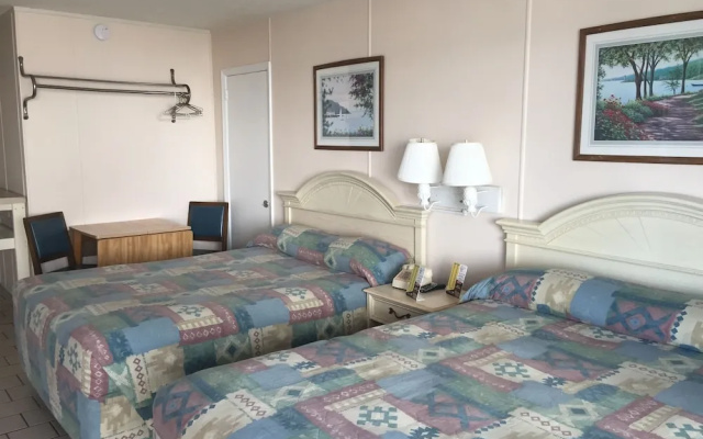 Standard Quadruple room with balcony and oceanfront