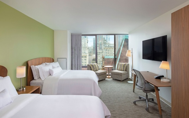 Deluxe Quadruple room with city view