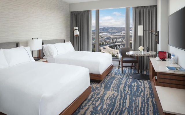 Twin room with runway view