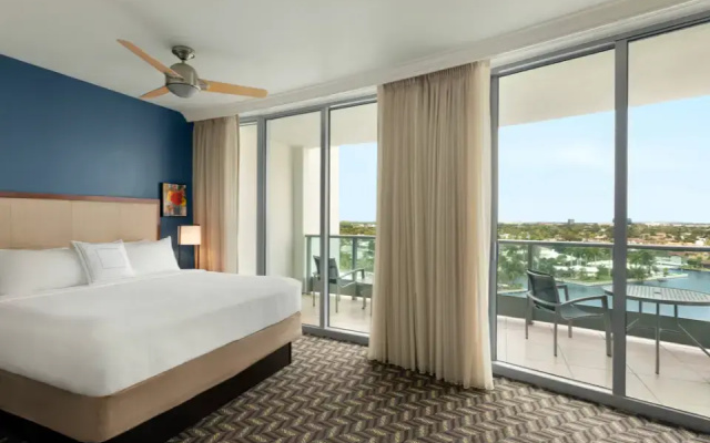 1 Bedroom Larger Terrace Double Suite with balcony and with partial water view