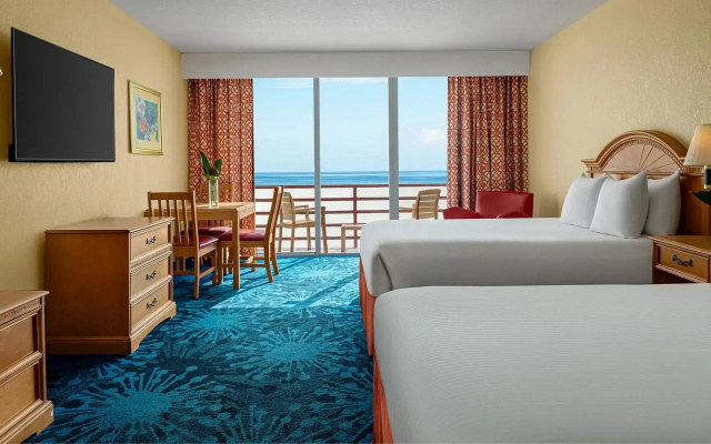 Twin room with balcony and beachfront