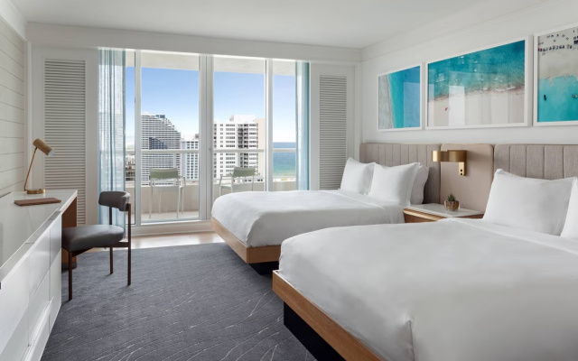 Twin room with partial ocean view