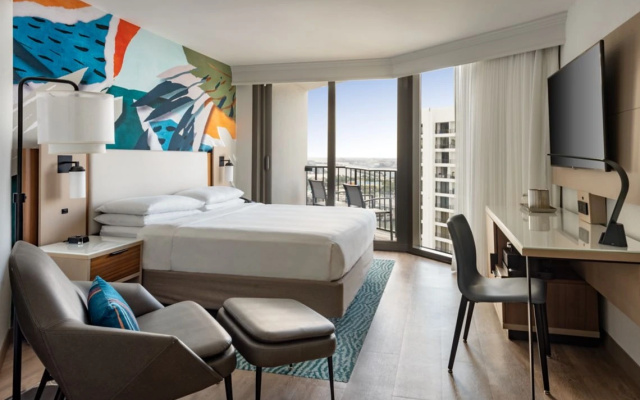 Room with balcony and with city view