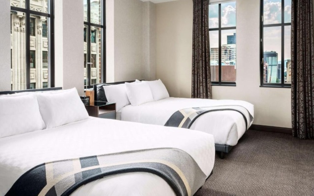 Deluxe Mobility Accessible with Roll-In Shower Quadruple room