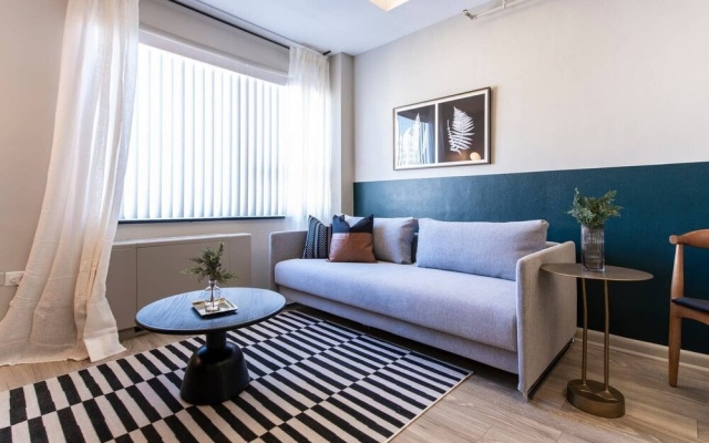 photo 2 of Abode Vue at 3rd 1-bedroom Loft Style Suite
