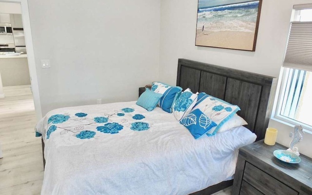 photo 4 of New Beach & Bay Retreat Full of Amenities!