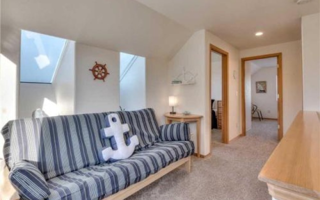 photo 3 of Beach Street Getaway- Seaside - 4 Br home by RedAwning