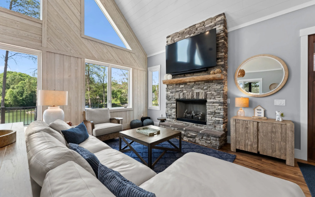 photo 3 of Luxe Lakefront Lodge w/ Pool, Hot Tub, Theater & Private Dock Sleeps 21