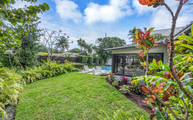 photo 2 of Boho Chic | Heated Pool | Walk To Beach | Escapism at its finest | Coconut Key