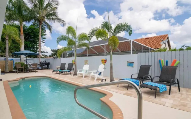 photo 2 of Charming Heated Pool Home - 3 miles to the Beach, Pet and Family Friendly -Available Year Round!
