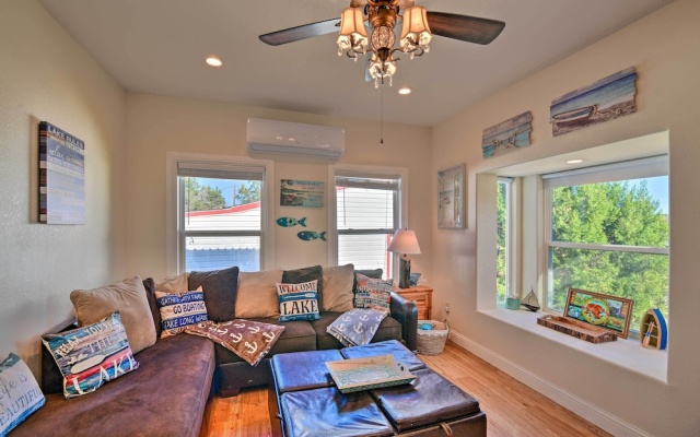 photo 2 of Steps to Lake! Charming Cabin: Pool Access & Decks