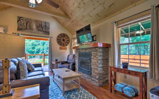 photo 2 of Deck & Hot Tub: Bryson City Riverfront Cabin!