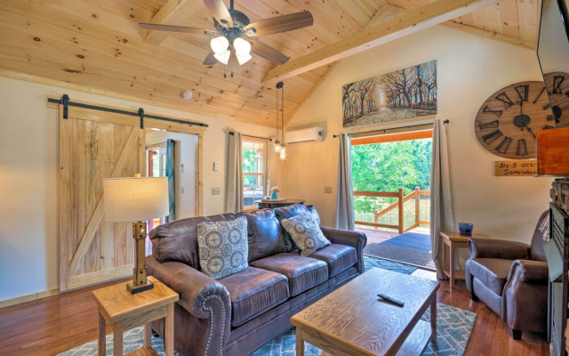 photo 3 of Deck & Hot Tub: Bryson City Riverfront Cabin!