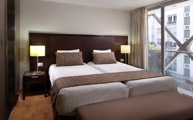 photo 3 of Arlington Court Suites, a Clarion Collection Hotel