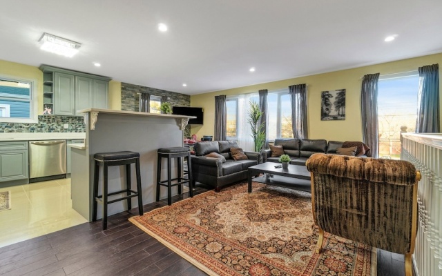 photo 4 of Comfy Queens Home - Just Minutes From Jfk Airport! 3 Bedroom Apts by Redawning