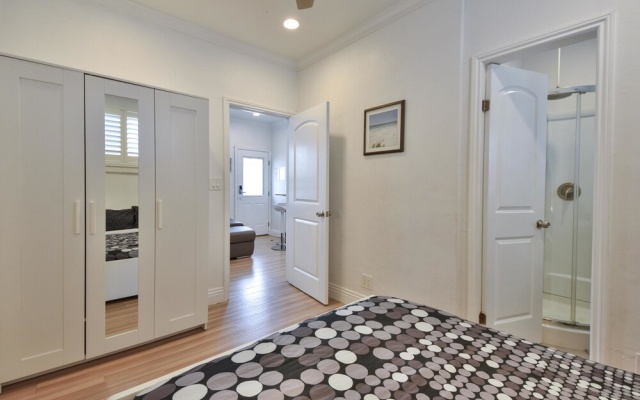 photo 2 of A4 Cozy Modern Beach Home With AC Steps From the Beach and Bay