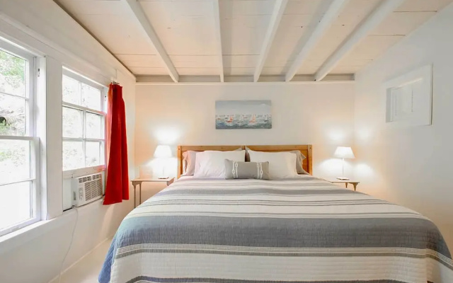 photo 5 of Cozy Stockbridge Cabin - Walk to Beach & Lake!
