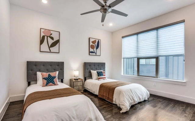 photo 3 of Cozysuites Luxe 3BR Uptown Home Great Rooftop