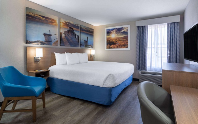photo 5 of Days Inn & Suites by Wyndham Commerce