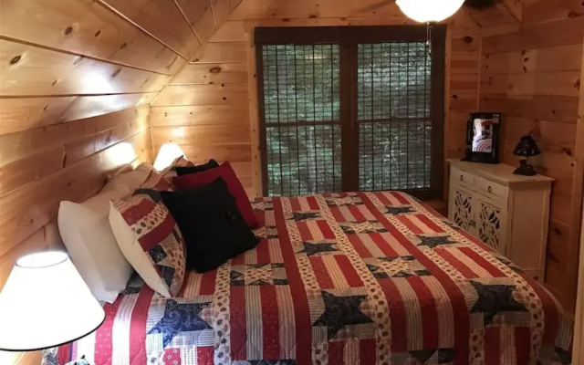 photo 3 of Harleys River Retreat - Charming Cabin in Coosawattee River Resort Hot tub