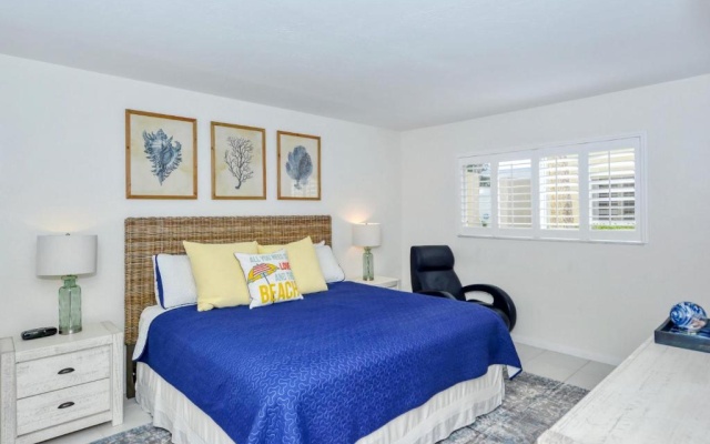 photo 2 of LaPlaya 101A Step out to the beach from your screened lanai Light and bright end unit