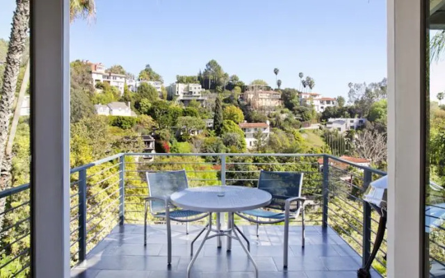 photo 3 of MidCentury Poolview Retreat by LuxPads