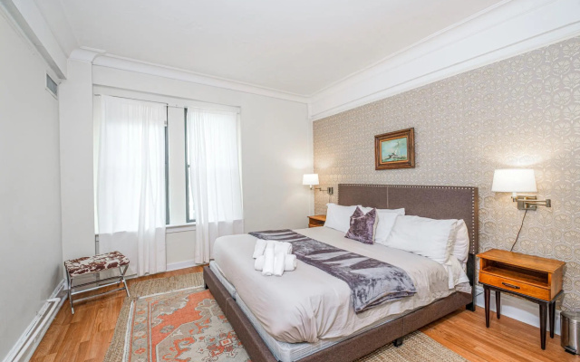 photo 2 of Modern 1BR + Train | Theatre District | Evonify