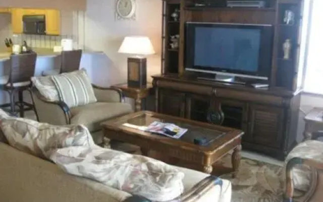 photo 2 of Luxurious Condo with Pool and Hot Tub Just a Walk to the beach by RedAwning