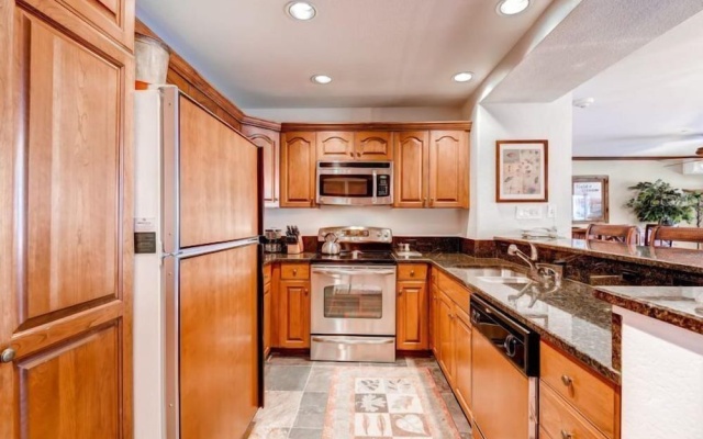 photo 4 of Ski, in Ski out 2 Bedroom Vacation Condo With Resort Amenities That Include Exercise Center, Indoor Pool, and Hot Tubs
