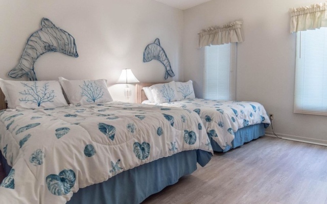 photo 2 of Tidewater Condo 54127 by RedAwning