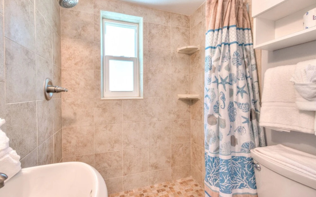 photo 4 of Tropic Terrace #10 - Beachfront Rental Studio Bedroom Condo by Redawning